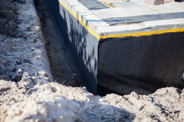 Professional Waterproofing technician working in Mount Pleasant, WI